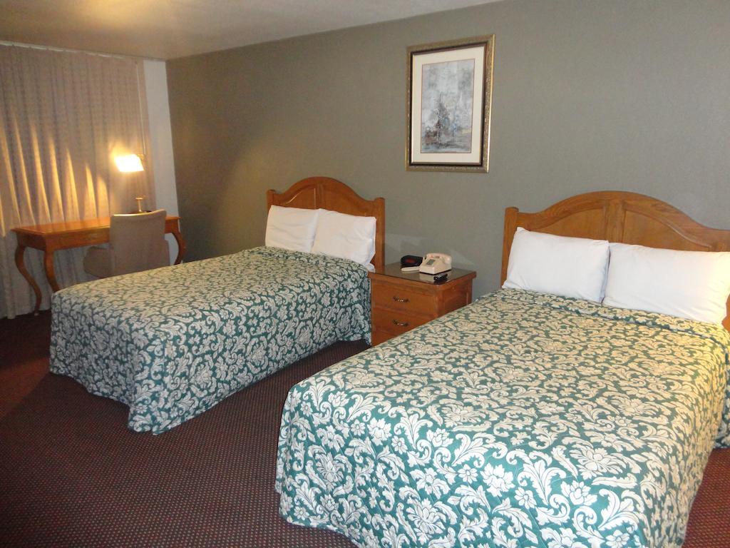 Garden Inn And Suites Silsbee Quarto foto